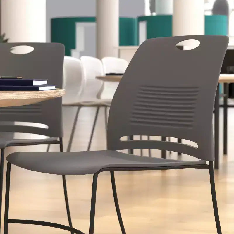 Flash Furniture HERCULES Series Commercial Grade 660 lb. Capacity Plastic Stack Chair with Powder Coated Sled Base Frame and Integrated Carrying Handle